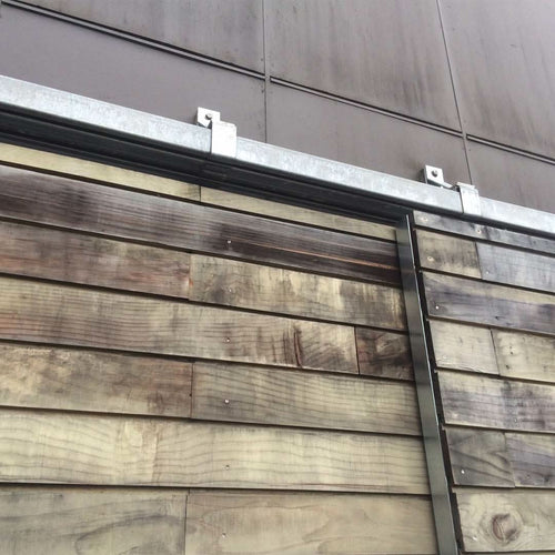 Gavanized Box Rail 400lb Bypass installed in an exterior area