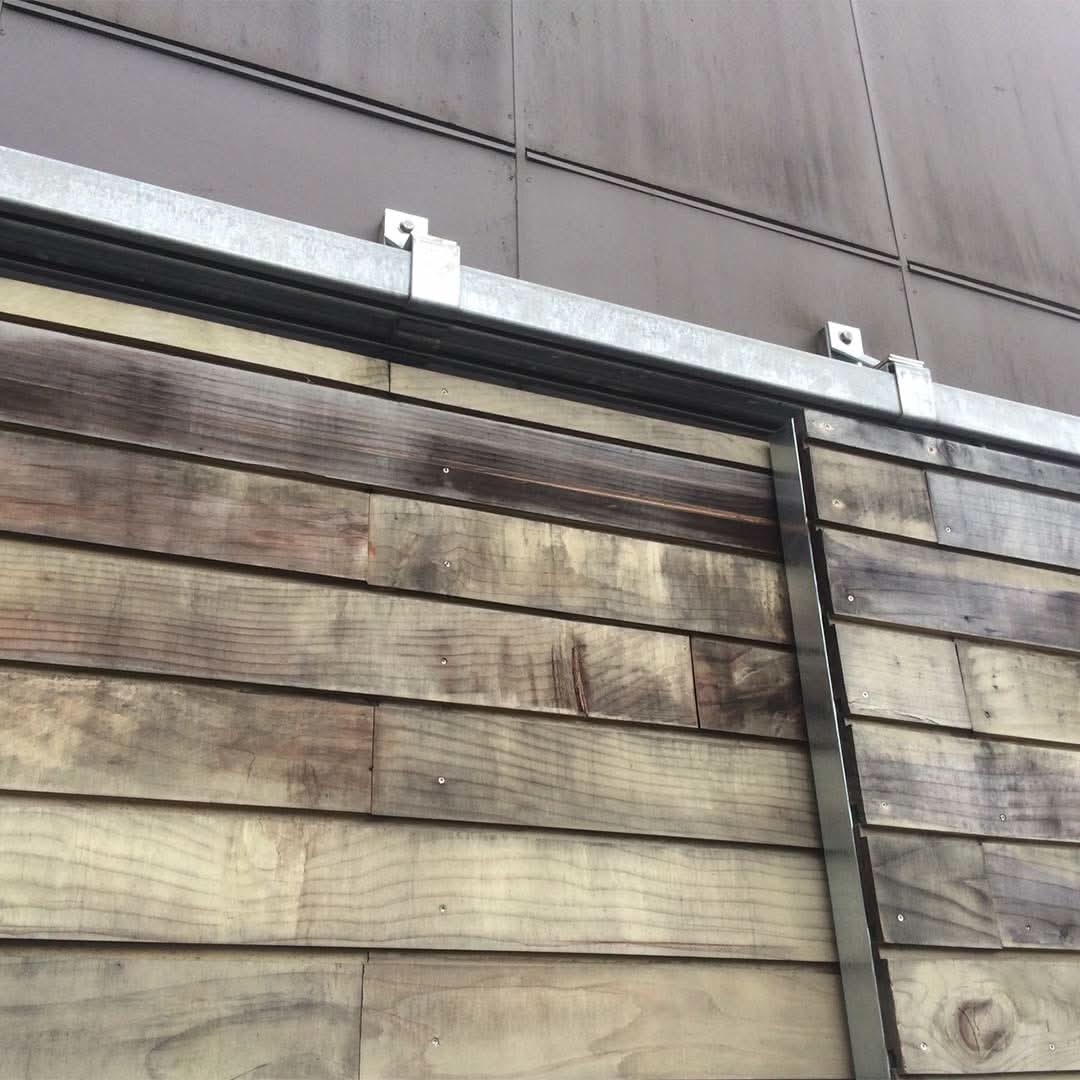 Black Box Rail 400lb Bypass installed on a blue door