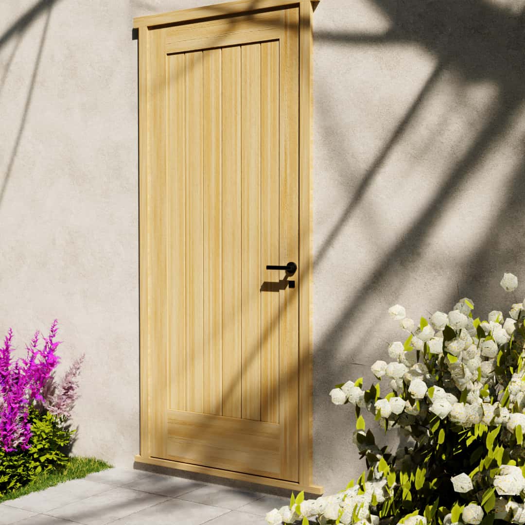 Maple Wood Modern Flush Plank Solid Core Exterior Front Door next to white and pink flower bushes