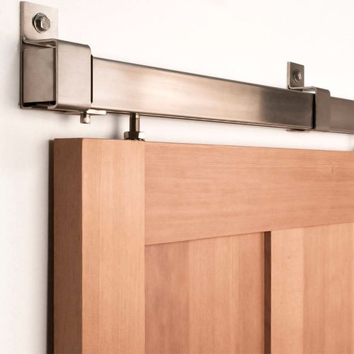 Box Rail Barn Door hardware installed on a beech wood door.