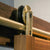 Swiss Rod Brass Sliding Barn Door Hardware Kit - Sliding Barn Door Hardware installed on sapele mahogany door.